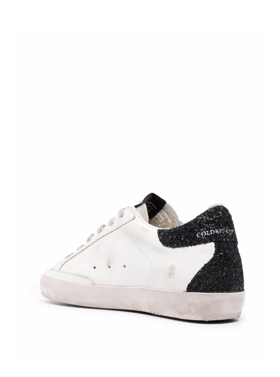 Golden Goose Super-Star in nappa leather with gold glitter star and black glitter heel tab